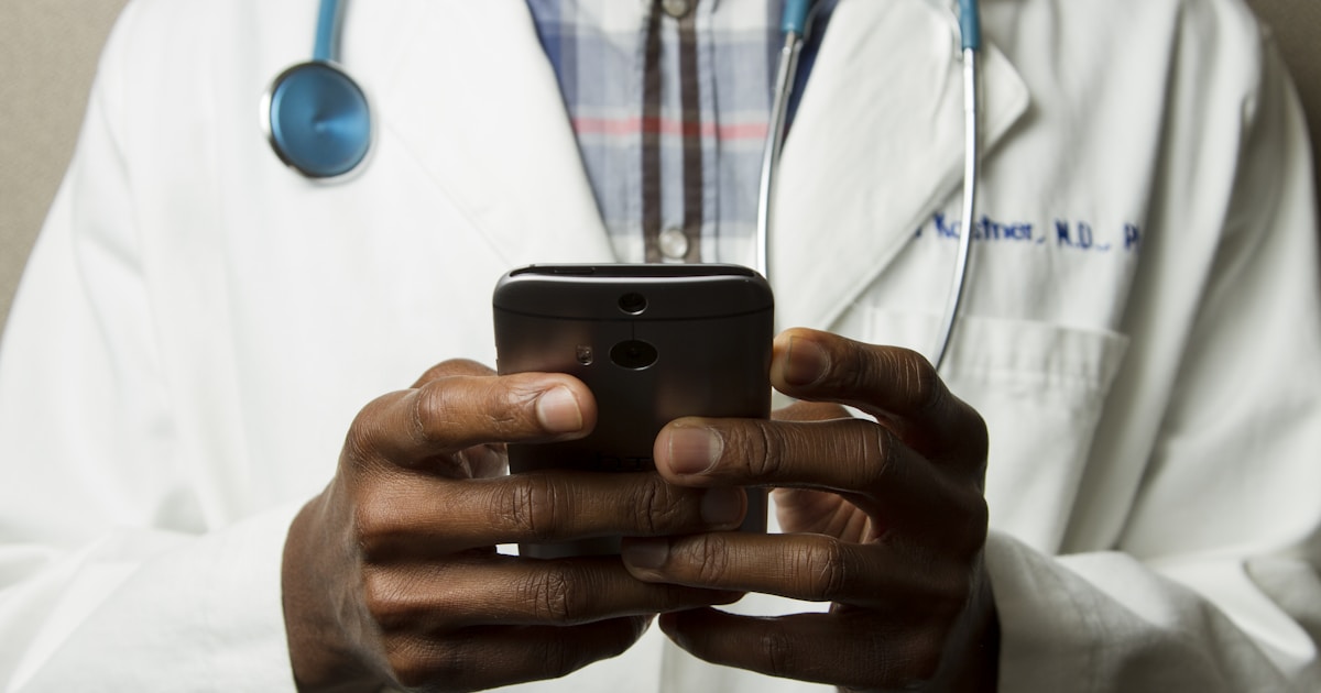 Doctor using digital technology in a modern healthcare setting
